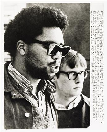 (BLACK PANTHERS) Group of 13 news photographs of the Black Panthers.